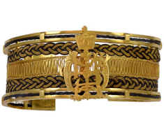 A unique gold bracelet with woven giraffe hair woven into it. A bracelet similar to this one was stolen from Louisa Vaughn in the armed home invasion. 2014 Naples Ninja News. All rights reserved.